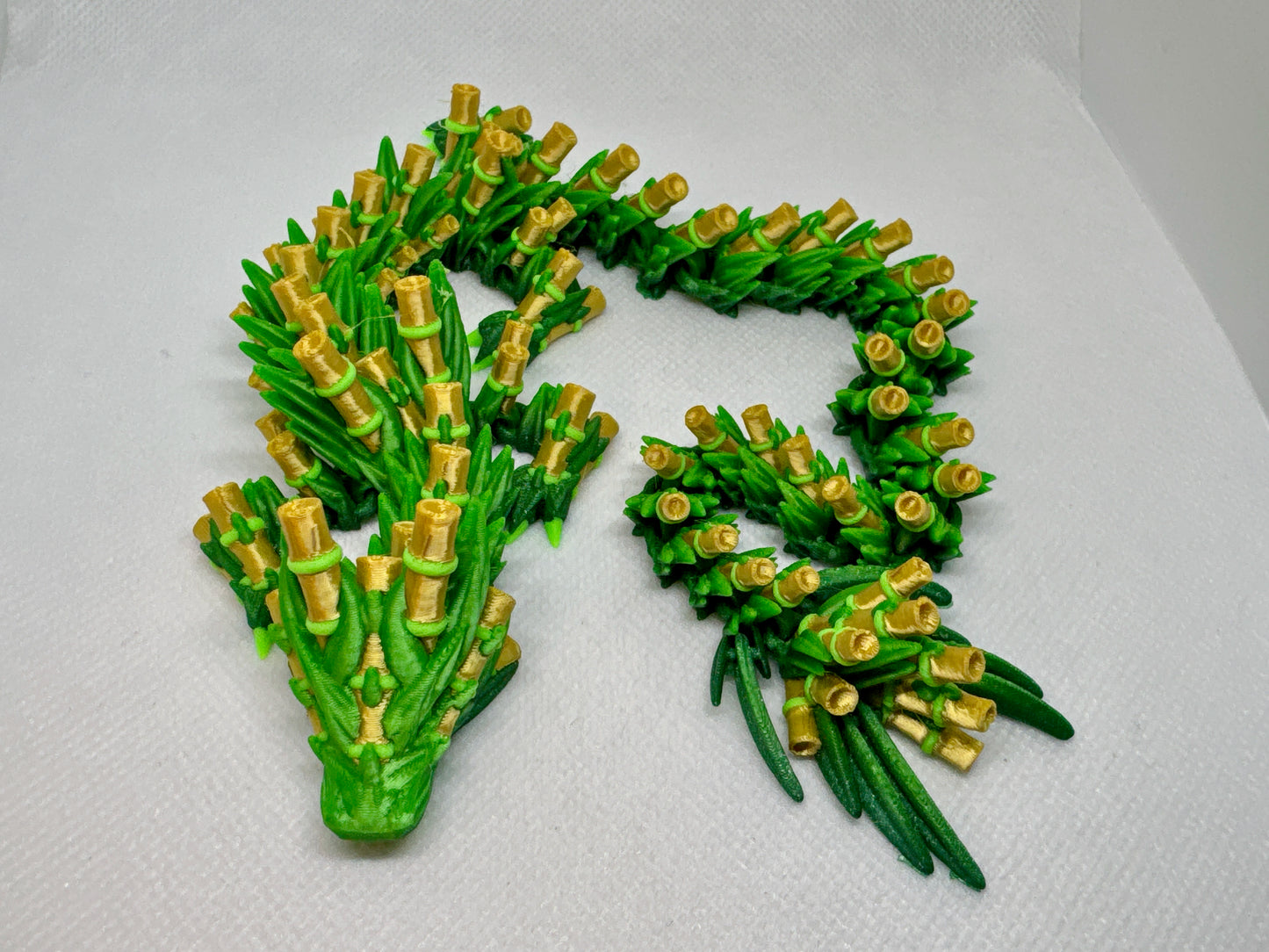Bamboo Dragon printed in Green, Neon Green, and Gold