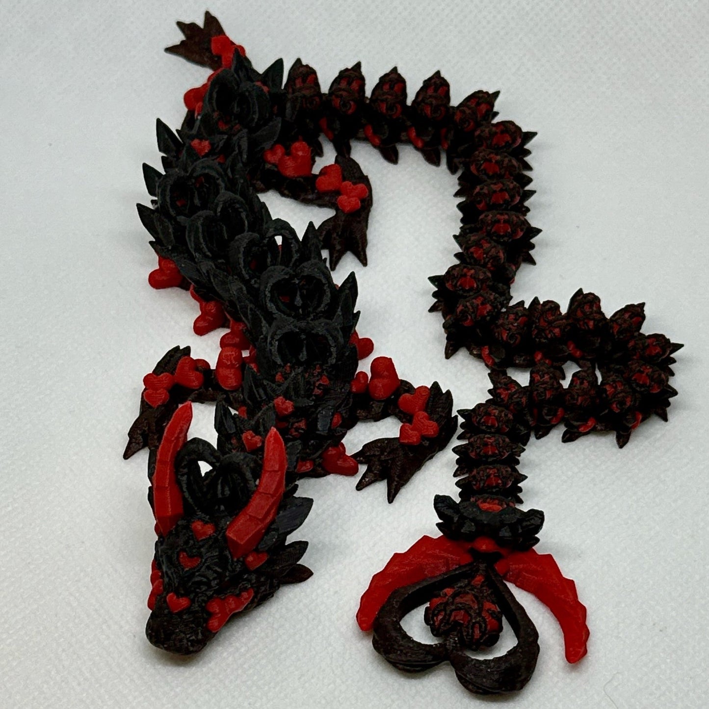 Dark Heart Dragon printed in Black and Iron Red