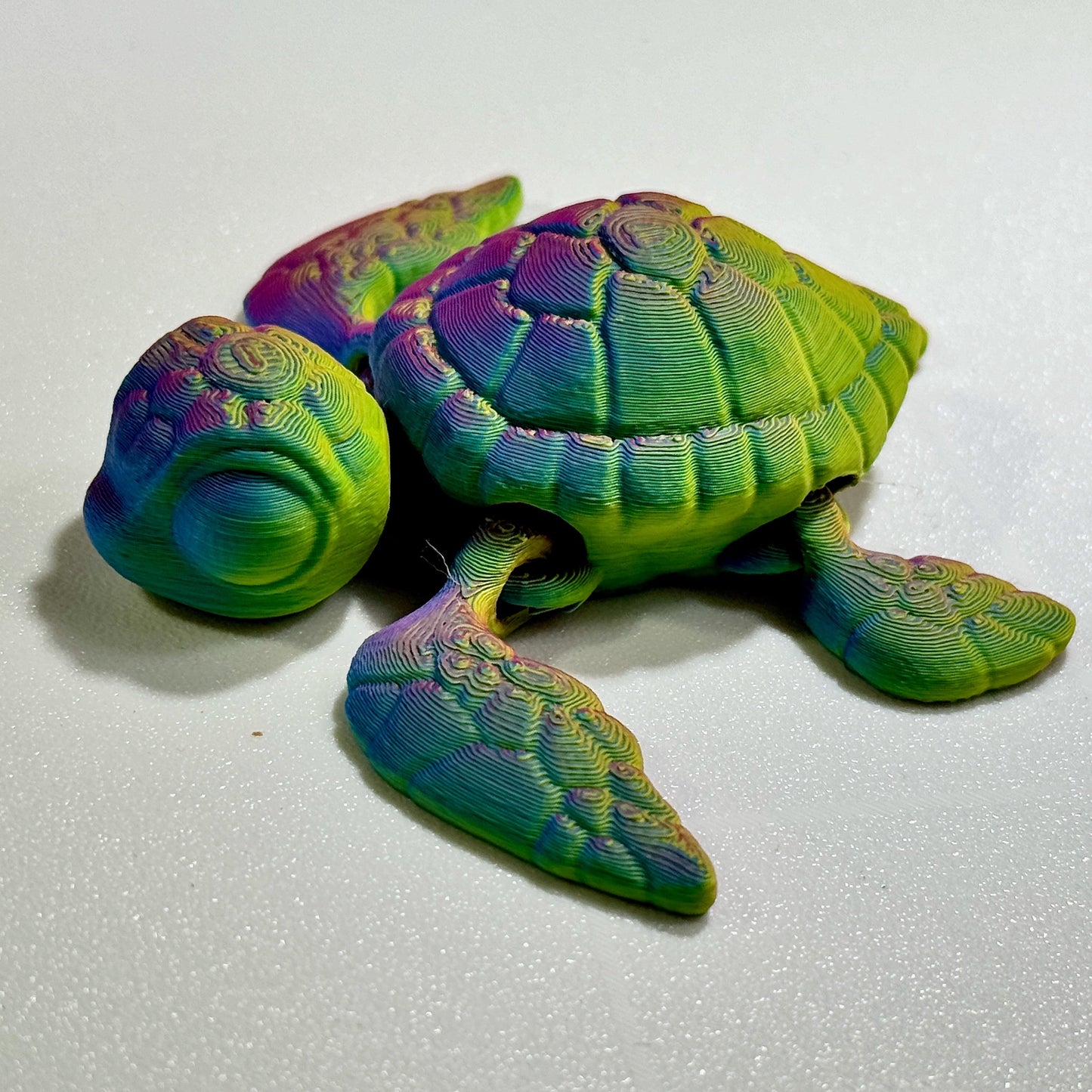 Tiny Sea Turtle printed in Rosy Cloud (Shift)